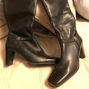Black smooth (and very soft) leather dress boots.